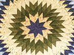 Lone Star with Appliqué Wreaths Quilt